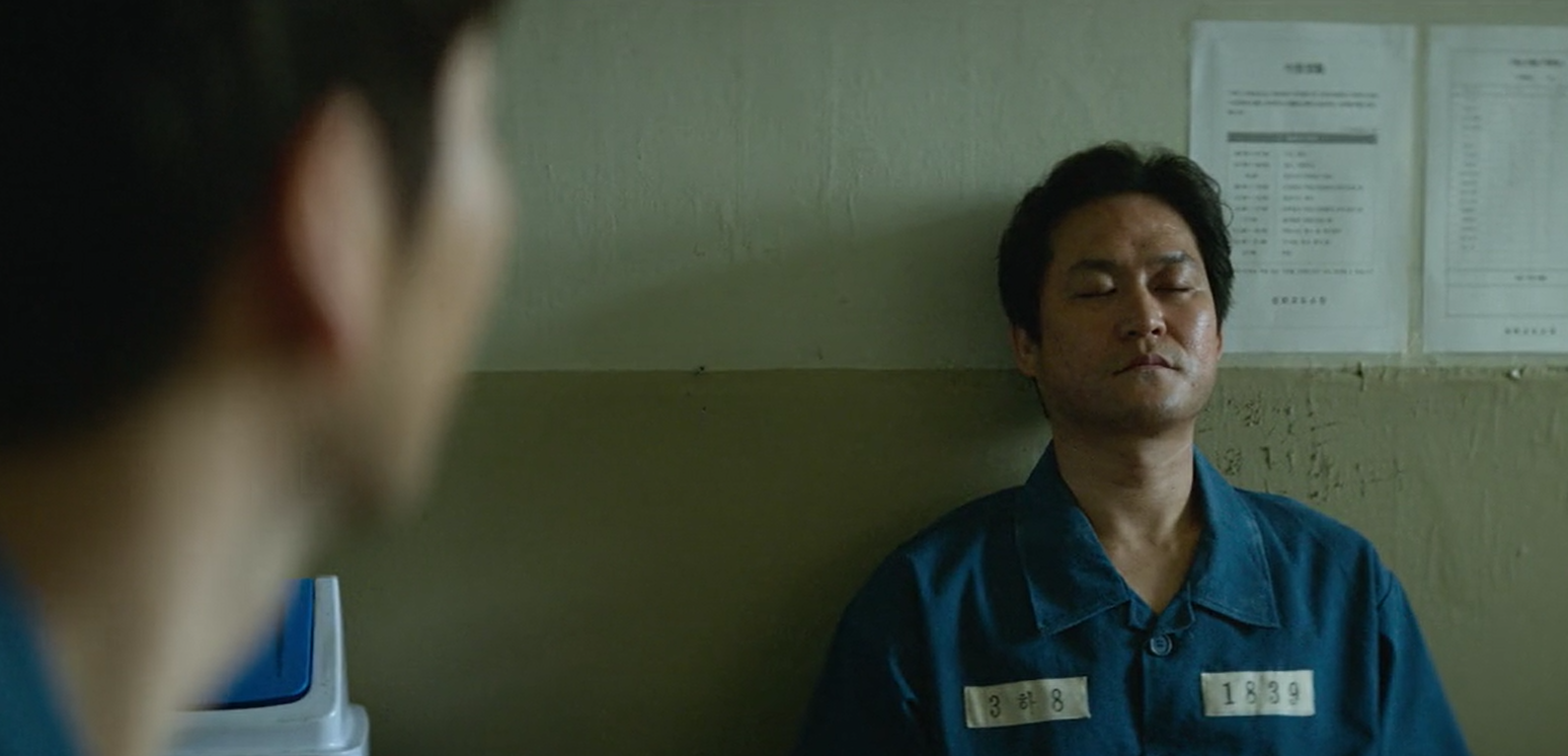 Jang-gil and the cyclist in jail