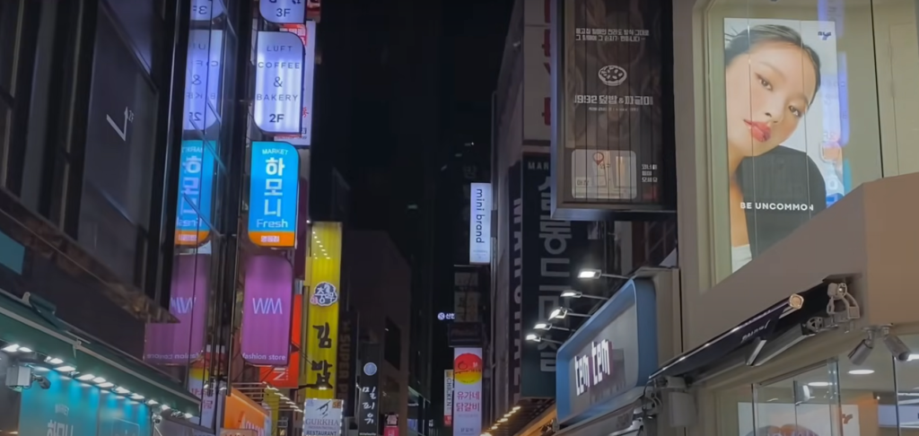 Myeongdong Street Market in Seoul with tourists and shopping mall