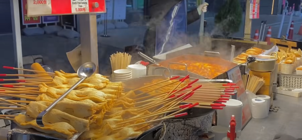 Myeongdong Street Market in Seoul with tourists and street food stalls