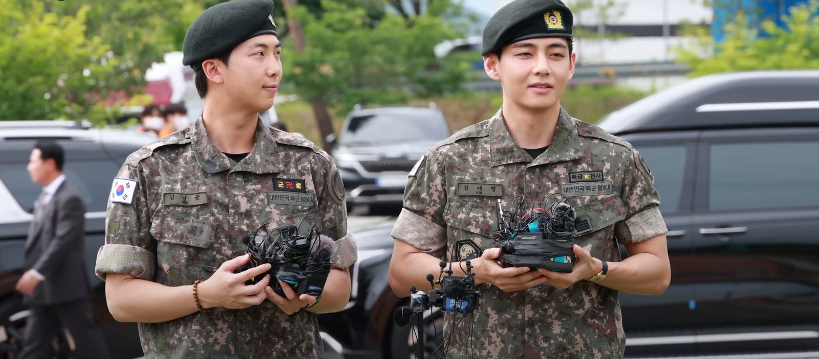 RM and V smiling after their military discharge in 10 June 2025